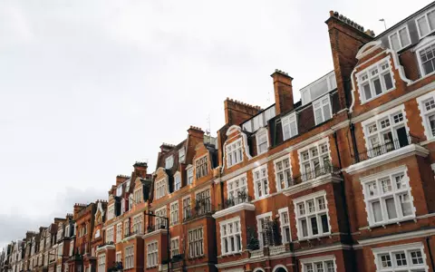 Red-brick Victorian mansion block of flats in London