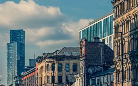A busy street in Manchester city centre