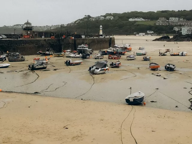 Boats in St Ives harbour, Cornwall, at low tide