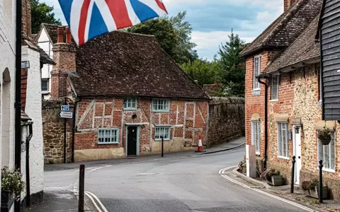 Historic timber-framed cottages in a Surrey village