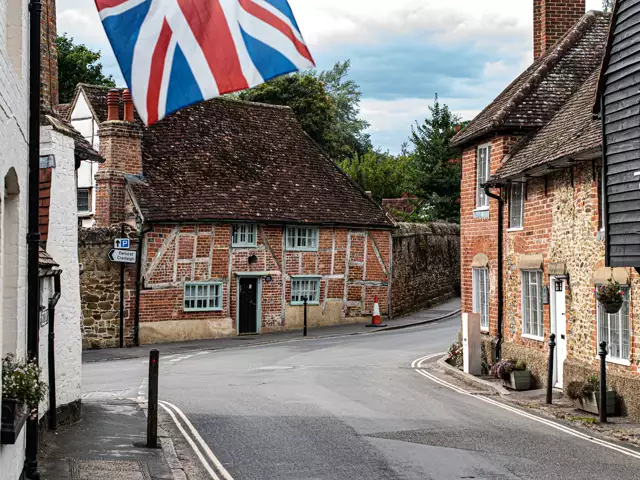 Historic cottages on a village street in Shere, Surrey